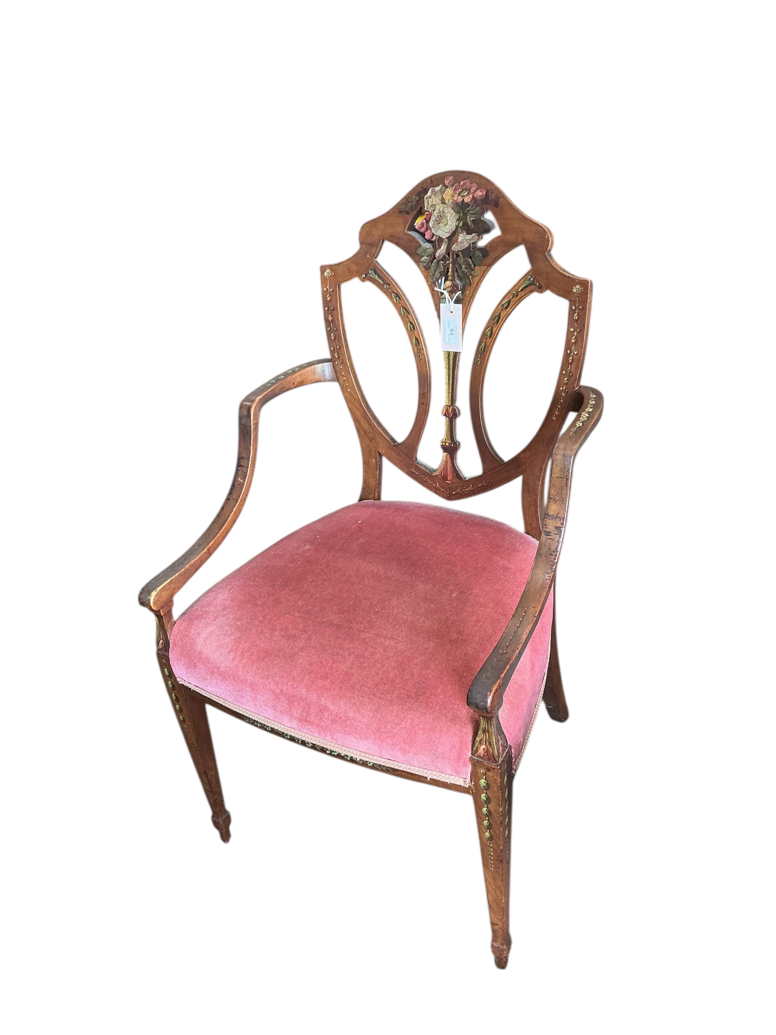A Hepplewhite style painted mahogany elbow chair and a Regency cane seated single chair and a George III Provincial elm chair